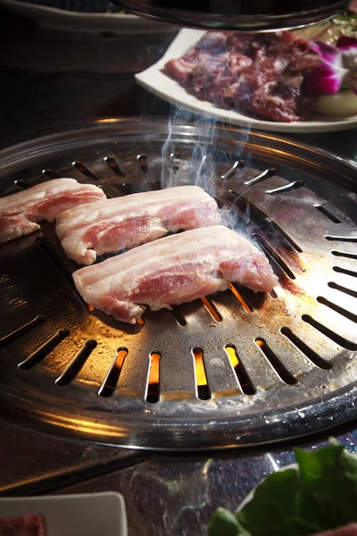 Un servizio di cucina usato illuminazione carne — Foto Stock