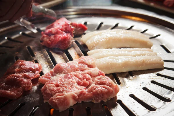 Uma cozinha atirar carne usada iluminação — Fotografia de Stock