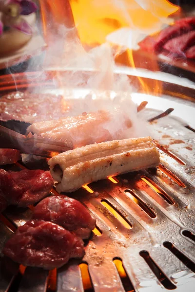 Uma cozinha atirar carne usada iluminação — Fotografia de Stock