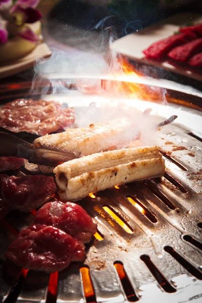 Uma cozinha atirar carne usada iluminação — Fotografia de Stock