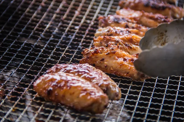 Uma cozinha atirar carne usada iluminação — Fotografia de Stock