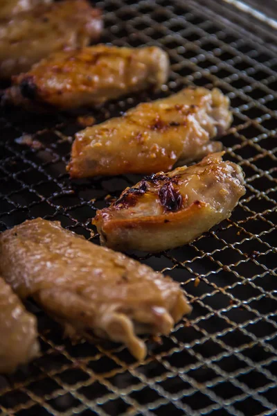 Uma cozinha atirar carne usada iluminação — Fotografia de Stock