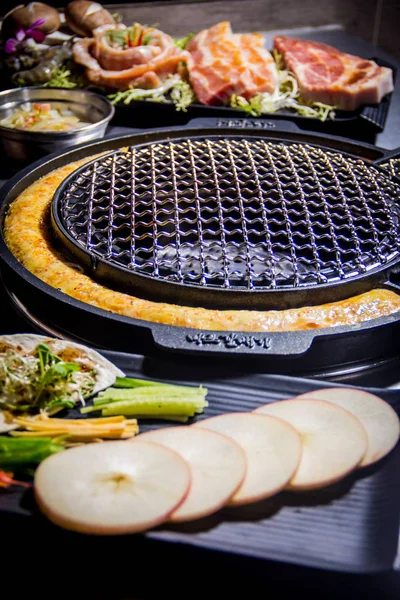 Uma cozinha atirar carne usada iluminação — Fotografia de Stock