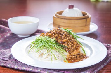  plate of noodles on table, closeup