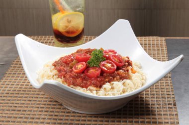  plate of noodles on table, closeup