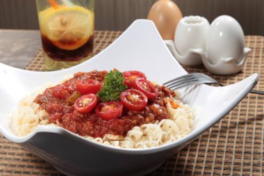  plate of noodles on table, closeup