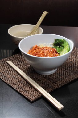  plate of noodles on table, closeup