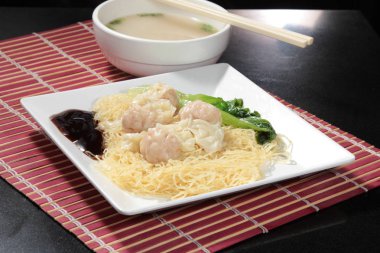  plate of noodles on table, closeup