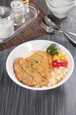 close up of plate of noodles on table  