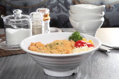 close up of plate of noodles on table  