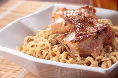  plate of noodles on table, closeup