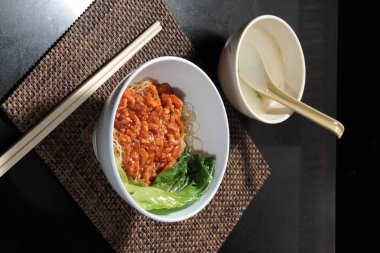  plate of noodles on table, closeup