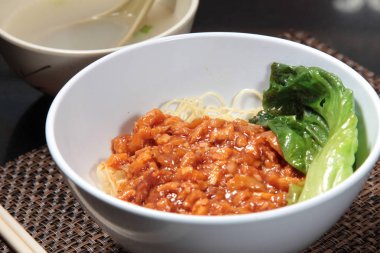  plate of noodles on table, closeup