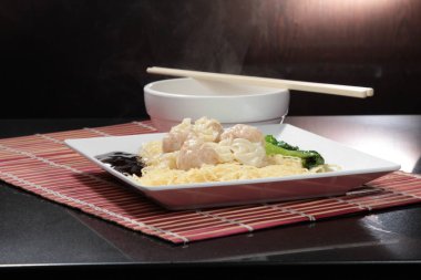  plate of noodles on table, closeup