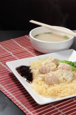  plate of noodles on table, closeup