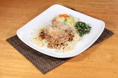  plate of noodles on table, closeup