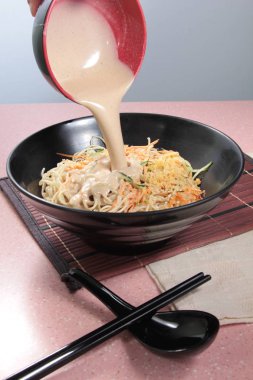  plate of noodles on table, closeup