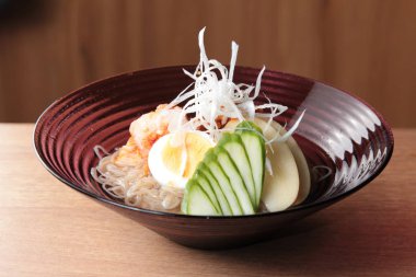  plate of noodles on table, closeup