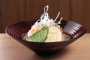  plate of noodles on table, closeup