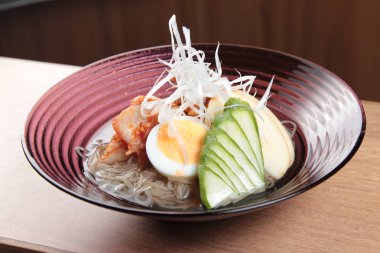  plate of noodles on table, closeup