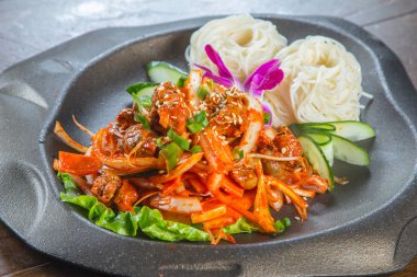  plate of noodles on table, closeup