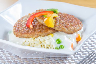  plate of noodles on table, closeup