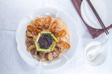  plate of noodles on table, closeup