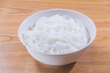  plate of noodles on table, closeup