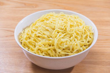  plate of noodles on table, closeup
