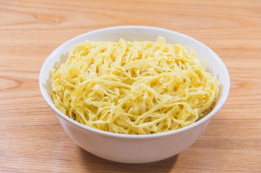  plate of noodles on table, closeup