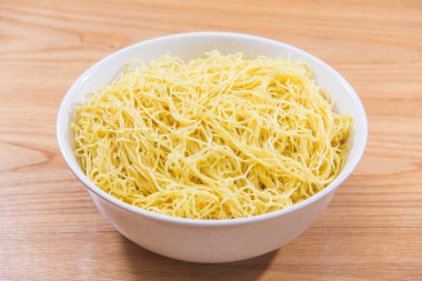  plate of noodles on table, closeup