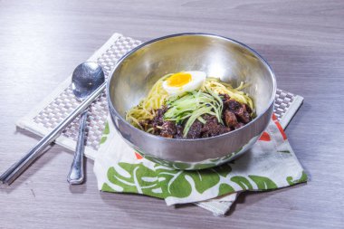  plate of noodles on table, closeup