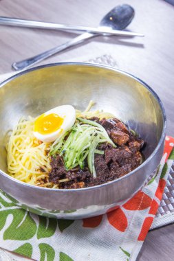  plate of noodles on table, closeup