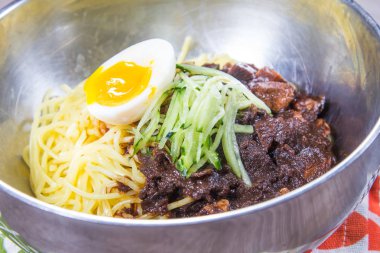  plate of noodles on table, closeup