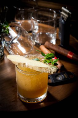 cocktail with fresh mint, lemon and lime slices