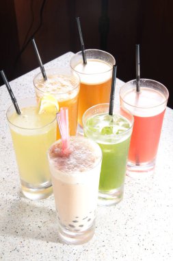 close up of a glass of cocktails with a drink