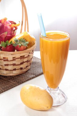 fresh juice with fruits and vegetables on white background