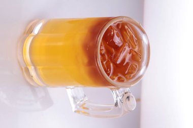 glass of coffee with ice cream on a white background
