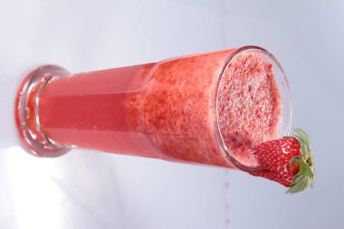 red wine in glass jar on white background