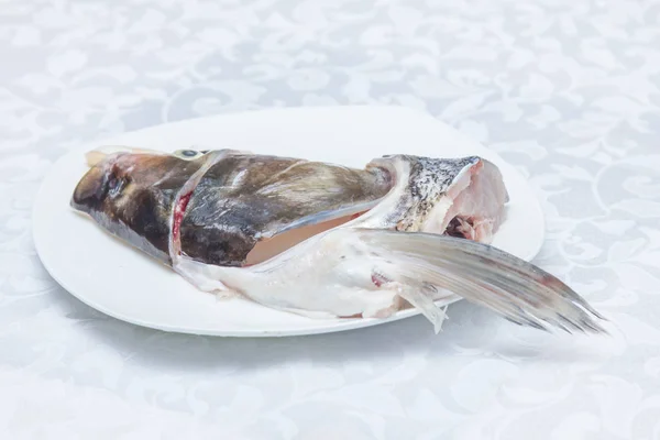 Uma cozinha atirar carne usada iluminação — Fotografia de Stock