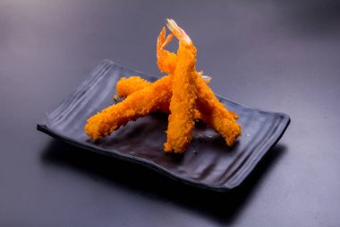 fried fish sticks with sauce