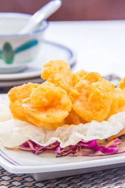 fried shrimp with cheese sauce