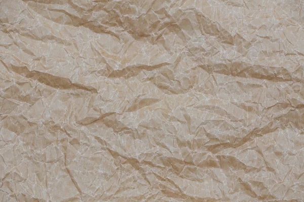 Papel kraft arrugado. Vista superior marrón textura de fondo de papel arrugado — Foto de Stock