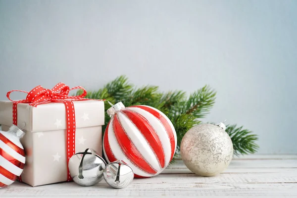 Gift box with christmas decorations — Stock Photo, Image