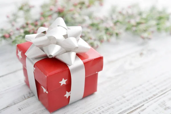 Gift box with silver ribbon — Stock Photo, Image