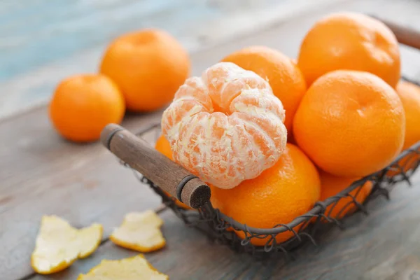 Tangerines in metal basket — Stock Photo, Image