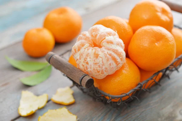 Tangerines in metal basket — Stock Photo, Image
