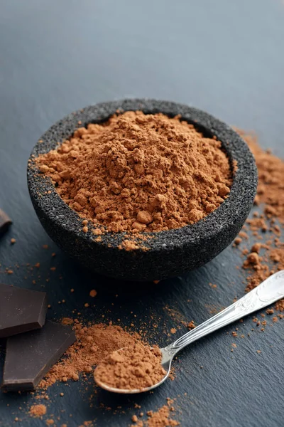 Cocoa powder in a bowl — Stock Photo, Image