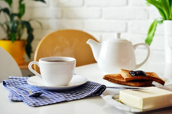Cup of tea and teapot — Stock Photo, Image