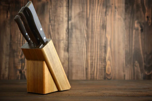 Knifes in wooden block — Stock Photo, Image